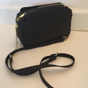 Leather black and gold purse